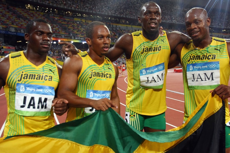 usain bolt 2008 beijing olympic games 4x100 relay race winners jamaica gold medal nesta carter asafa powell track field running