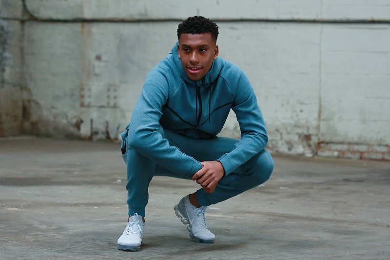Alex Iwobi Wearing Nike Air VaporMax grey tech fleece blue