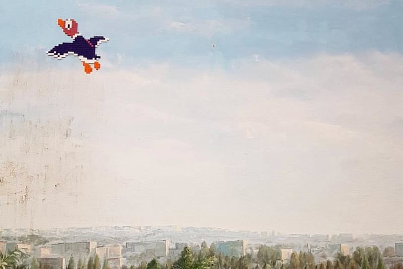 Invader Reveals New 'Duck Hunt' Mosaic in France