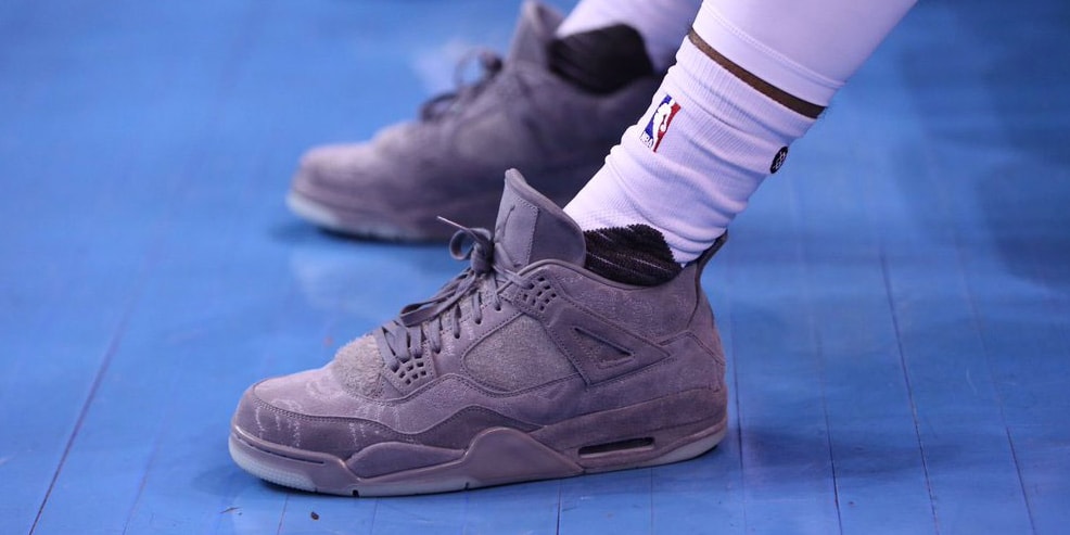 Gary Payton II Wears the KAWS Jordan 4 During NBA Game  display picture 2