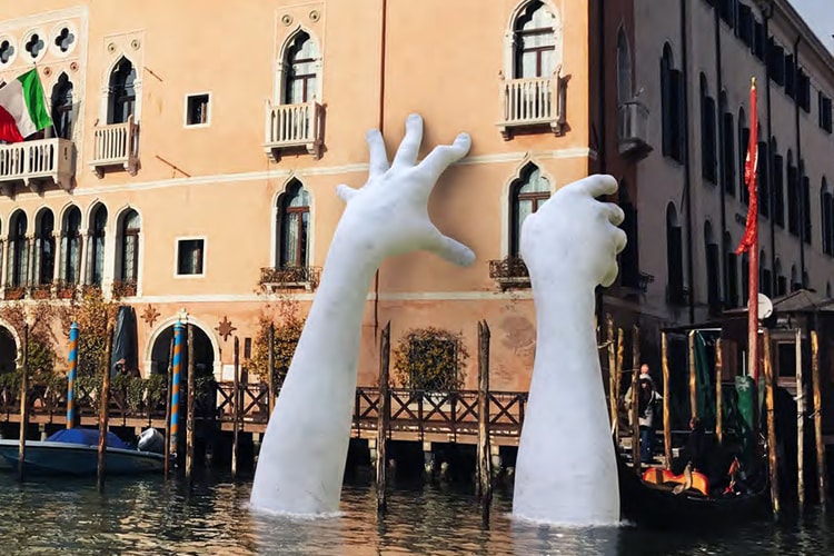 Massive Hands Emerge From Canals for Venice Biennale