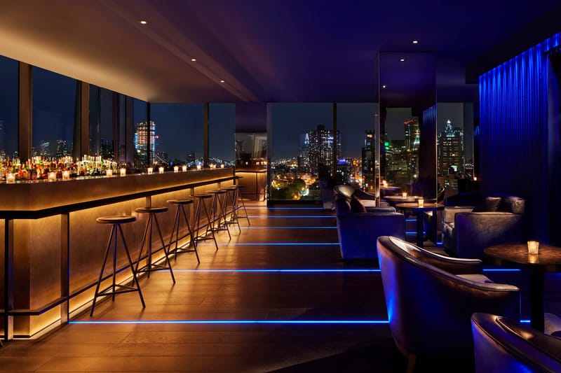 Public Hotel by Herzog & De Meuron Features Minimalist Furnishing & Cabin-Inspired Interiors