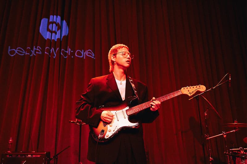 Beats by Dre Luke Wood Hyukoh Interview frontman Hyuk playing guitar red curtain