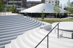Nendo Transforms Japanese Station Plaza Into Multi-Purpose Hub Filled With White Circular Structures