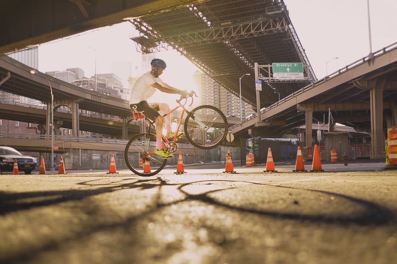 VSCO x Oakley Prizm Road Lens biking underneath highway