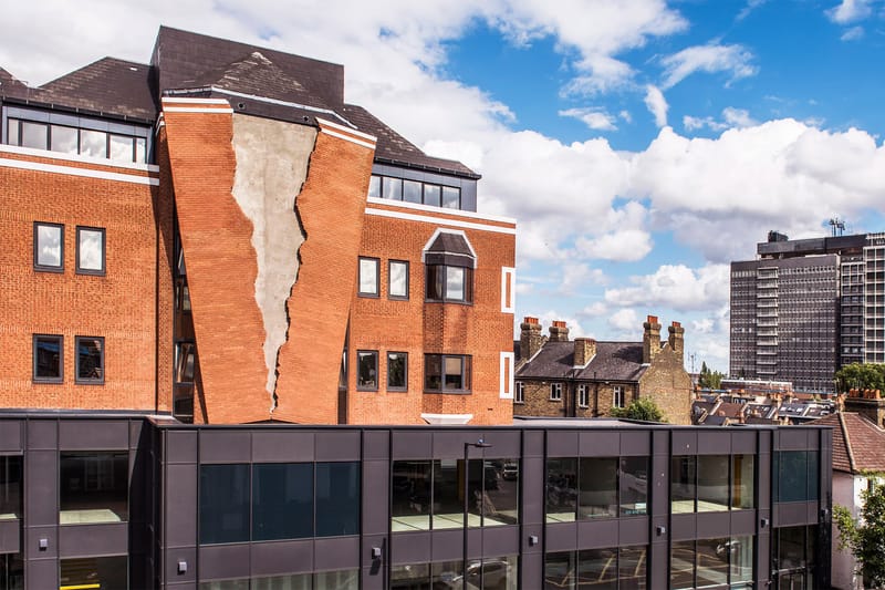 Artist Alex Chinneck's Creates a Cracked Optical Illusion on Brick Facade