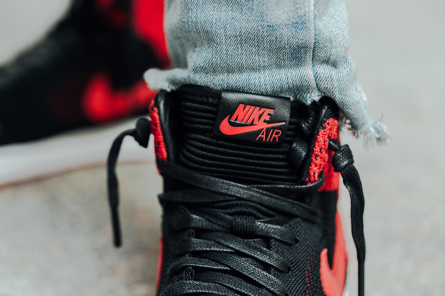 Air Jordan 1 Flyknit Bred Black White Varsity Red Detailed Look Michael Jordan sneakers Jordan Brand Closer Look