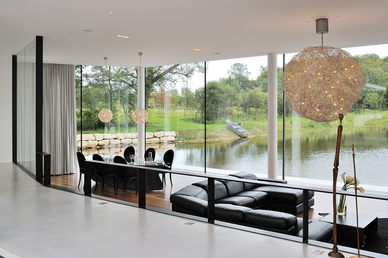 AUM Architects Architecture Design White Snake House France Lake Top White Concrete Glass Swimming Pool Gym