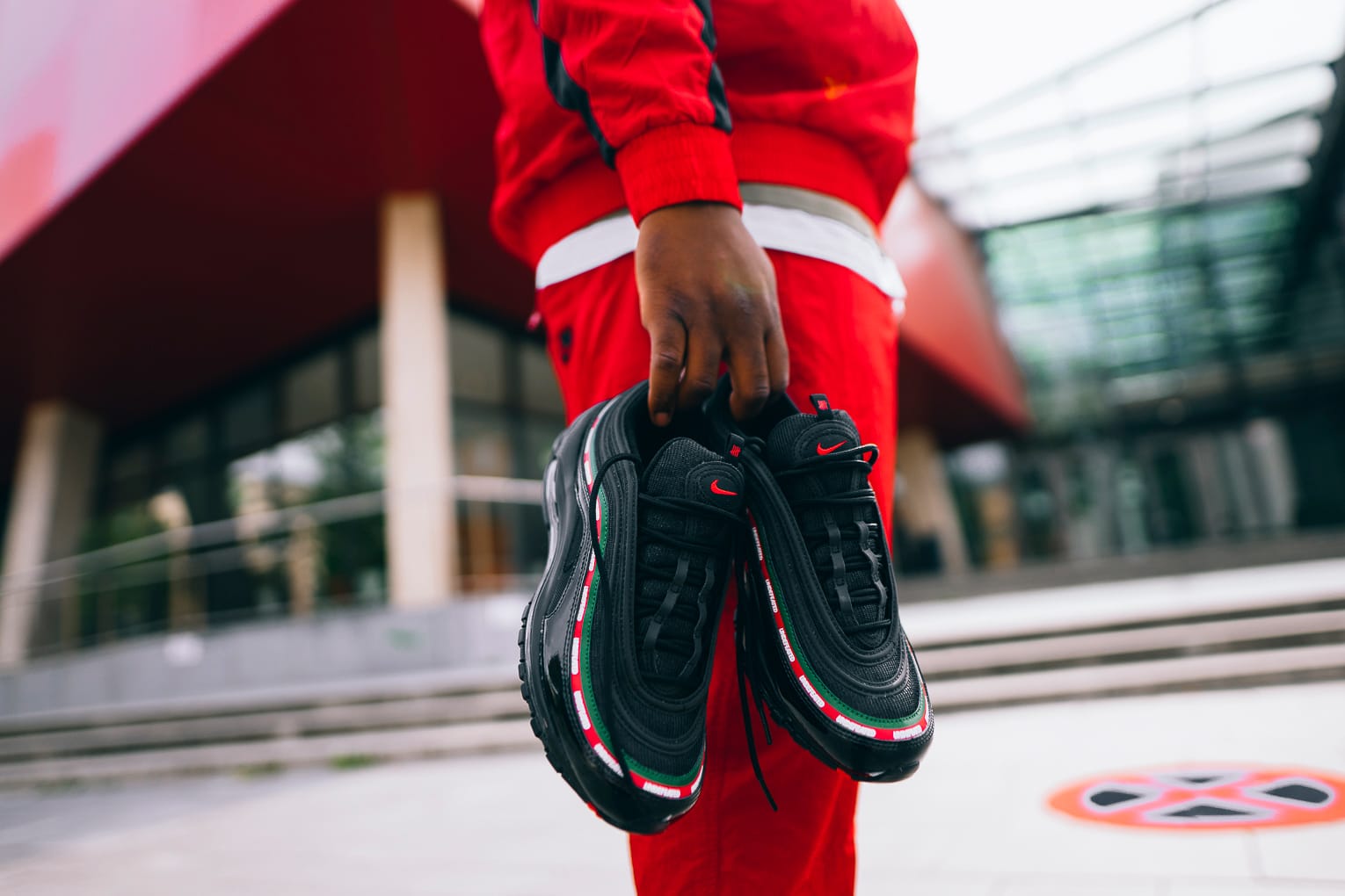 air max 97 undefeated black on feet