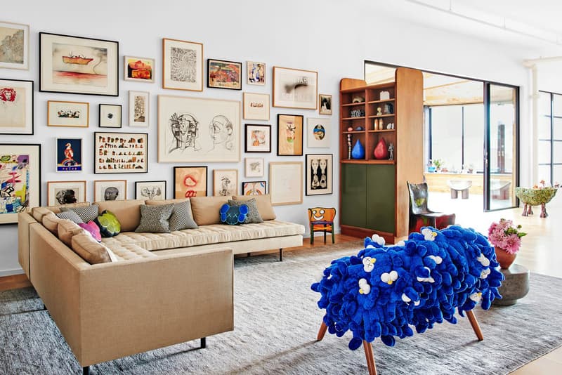 KAWS Brooklyn Home House Architectural Digest Cover Story takashi murakami paintings studio magazine wall sculptures bff chairs