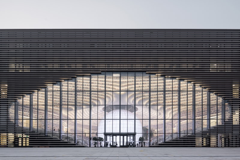 Tianjin Binhai Library China Design By MVRDV develop GMP architekten architecture architectures sphere ball white bgass urban planning and design institute TUPDI cave books bookshelves bookshelf orb eye