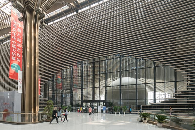 Tianjin Binhai Library China Design By MVRDV develop GMP architekten architecture architectures sphere ball white bgass urban planning and design institute TUPDI cave books bookshelves bookshelf orb eye