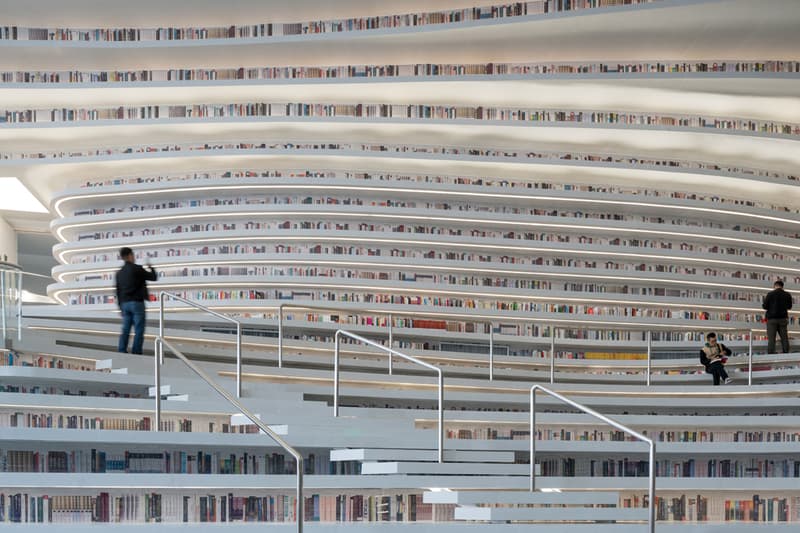 Tianjin Binhai Library China Design By MVRDV develop GMP architekten architecture architectures sphere ball white bgass urban planning and design institute TUPDI cave books bookshelves bookshelf orb eye