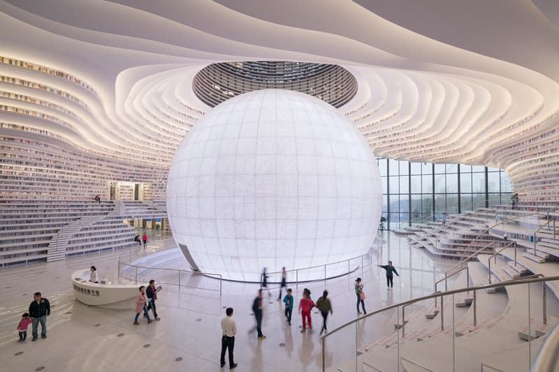 Tianjin Binhai Library China Design By MVRDV develop GMP architekten architecture architectures sphere ball white bgass urban planning and design institute TUPDI cave books bookshelves bookshelf orb eye