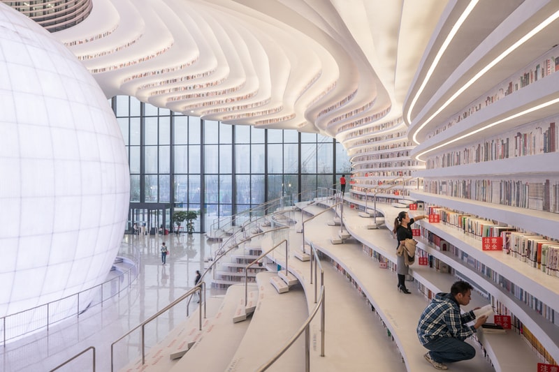 Tianjin Binhai Library China Design By MVRDV develop GMP architekten architecture architectures sphere ball white bgass urban planning and design institute TUPDI cave books bookshelves bookshelf orb eye