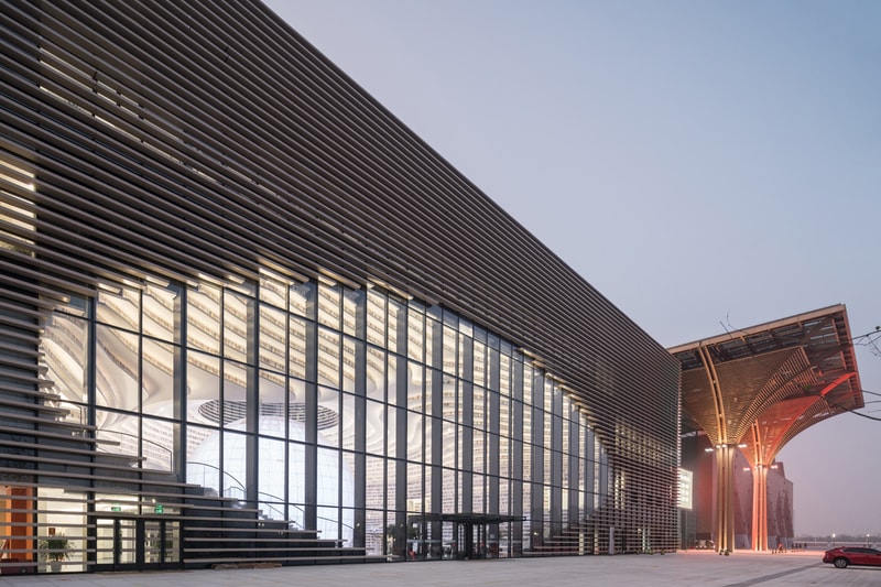 Tianjin Binhai Library China Design By MVRDV develop GMP architekten architecture architectures sphere ball white bgass urban planning and design institute TUPDI cave books bookshelves bookshelf orb eye