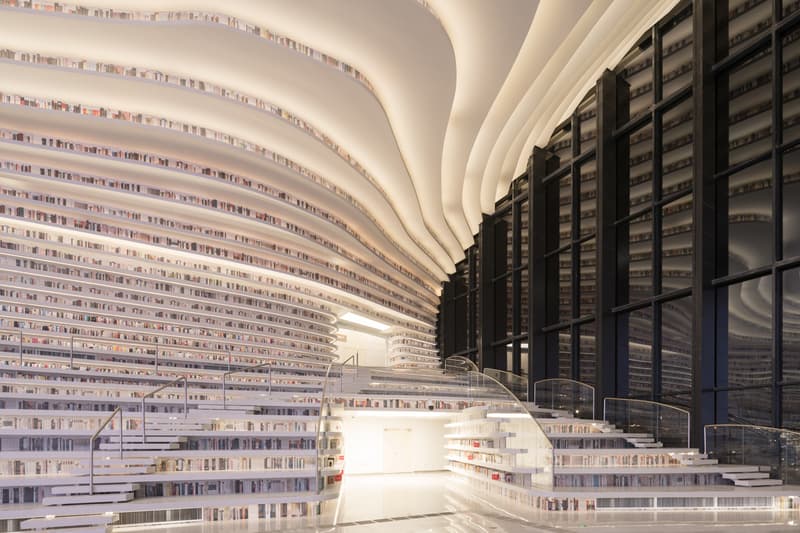 Tianjin Binhai Library China Design By MVRDV develop GMP architekten architecture architectures sphere ball white bgass urban planning and design institute TUPDI cave books bookshelves bookshelf orb eye