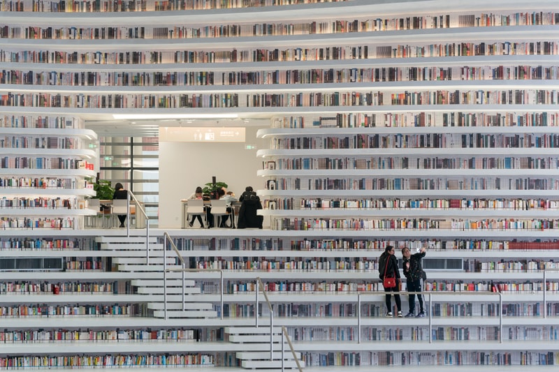 Tianjin Binhai Library China Design By MVRDV develop GMP architekten architecture architectures sphere ball white bgass urban planning and design institute TUPDI cave books bookshelves bookshelf orb eye
