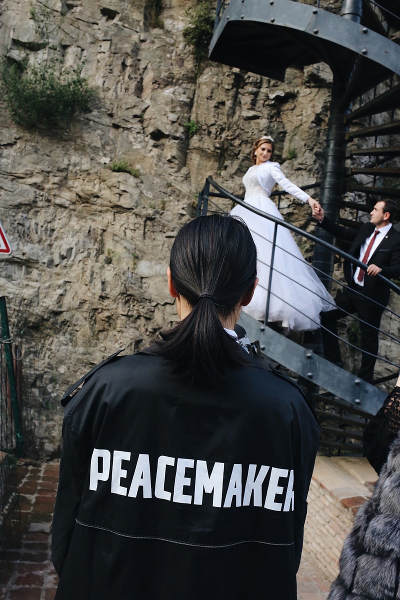 OAMC "Peacemaker" black nylon trench coat Military-inspired Luke Meier