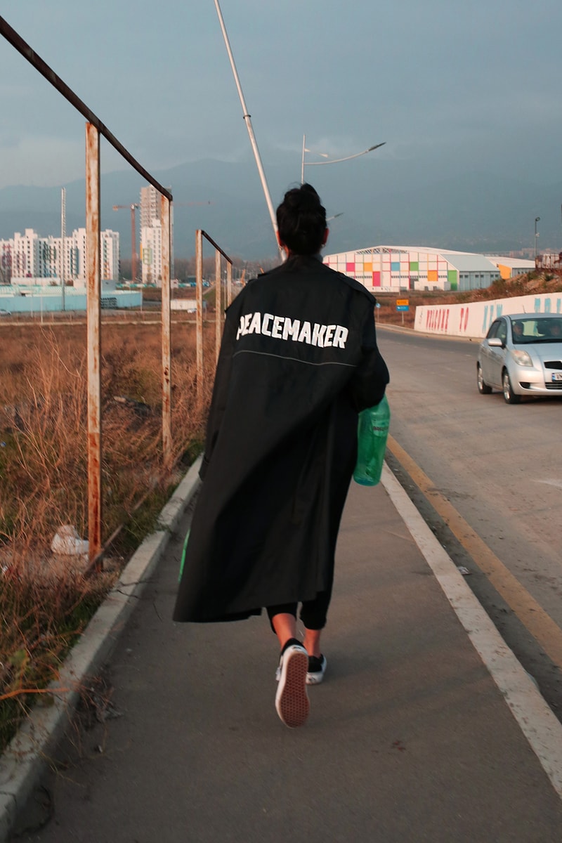 OAMC "Peacemaker" black nylon trench coat Military-inspired Luke Meier