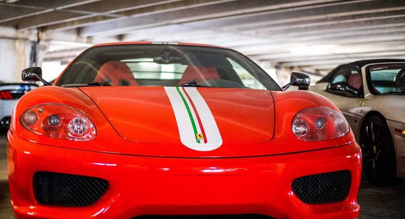 Supercars Collecting Dust Parking Garage Alfa Romeo Aston Martin Chevrolet Chrysler Prowler Ferrari Ford GT Mustang Jaguar Lamborghini Aventador Porsche