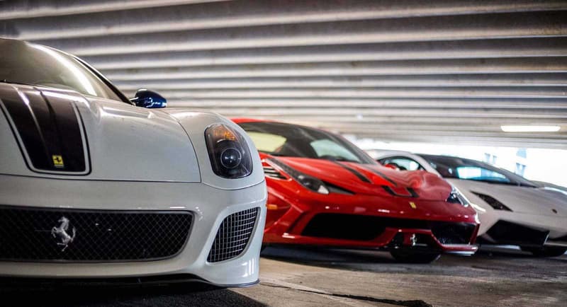 Supercars Collecting Dust Parking Garage Alfa Romeo Aston Martin Chevrolet Chrysler Prowler Ferrari Ford GT Mustang Jaguar Lamborghini Aventador Porsche