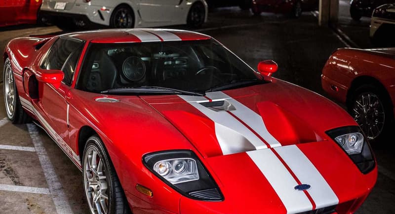 Supercars Collecting Dust Parking Garage Alfa Romeo Aston Martin Chevrolet Chrysler Prowler Ferrari Ford GT Mustang Jaguar Lamborghini Aventador Porsche