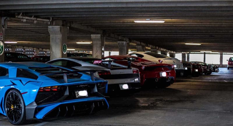Supercars Collecting Dust Parking Garage Alfa Romeo Aston Martin Chevrolet Chrysler Prowler Ferrari Ford GT Mustang Jaguar Lamborghini Aventador Porsche