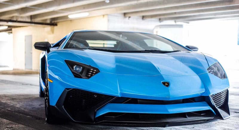 Supercars Collecting Dust Parking Garage Alfa Romeo Aston Martin Chevrolet Chrysler Prowler Ferrari Ford GT Mustang Jaguar Lamborghini Aventador Porsche