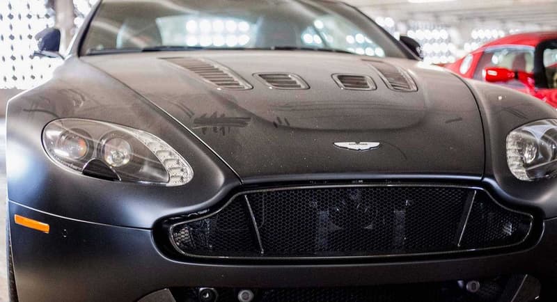 Supercars Collecting Dust Parking Garage Alfa Romeo Aston Martin Chevrolet Chrysler Prowler Ferrari Ford GT Mustang Jaguar Lamborghini Aventador Porsche