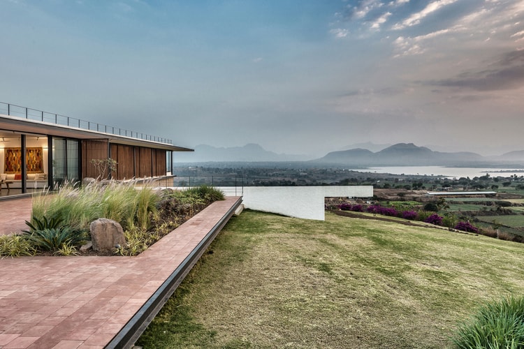 The "House With the Soaring Rock" Opens Out to the Sunset