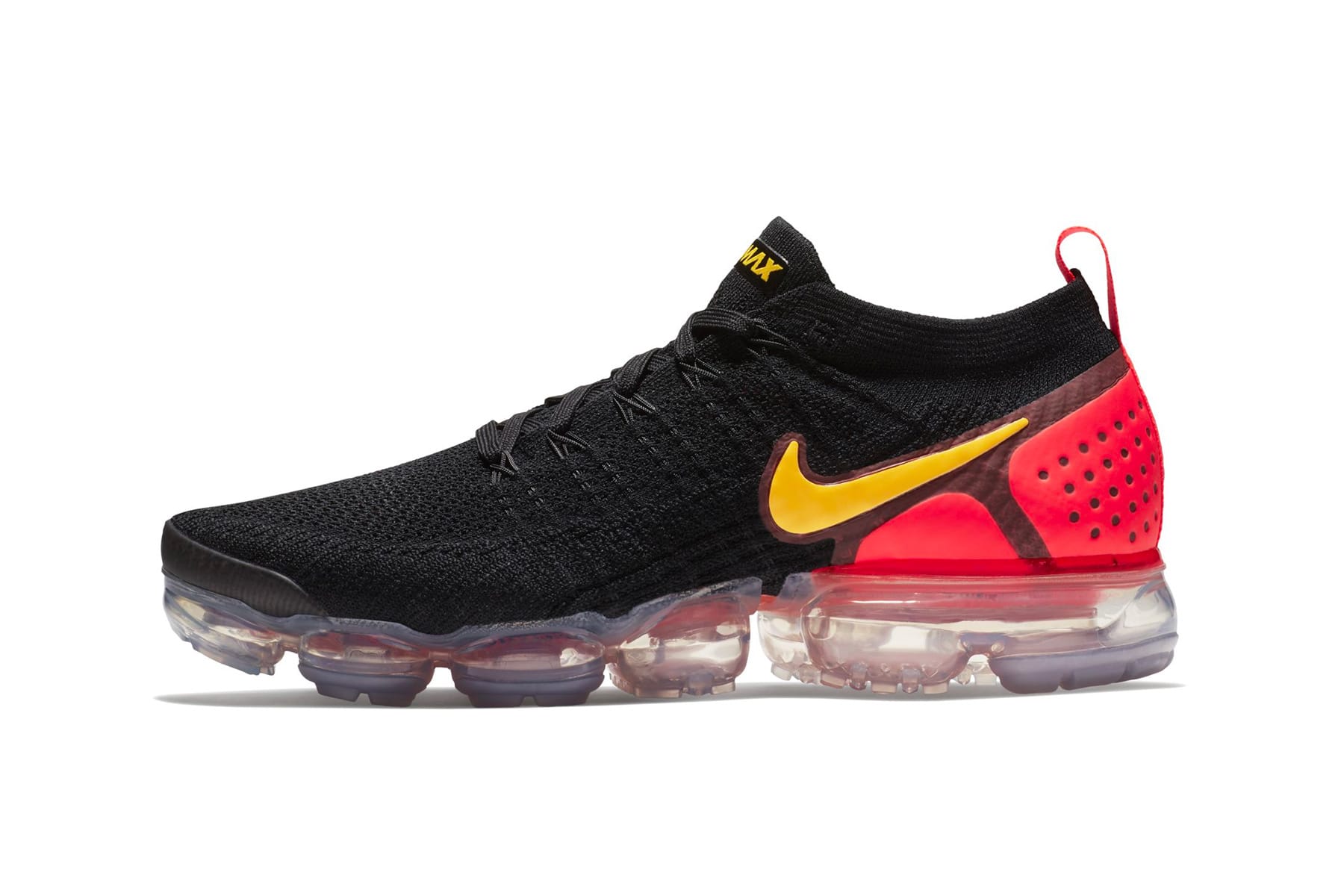 all black vapormax with red