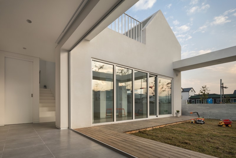Architects Group RAUM Yangsan Eorinjip South Korea Homes Houses Interior Exterior Modern White Design Wooden Decking Compartments Architecture Inspiration