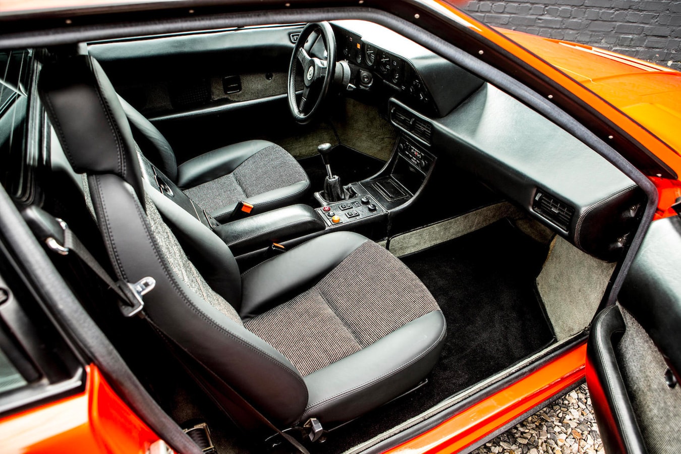 BMW M1 classic coupe orange car vintage rare auction price 1980 automobile bonhams