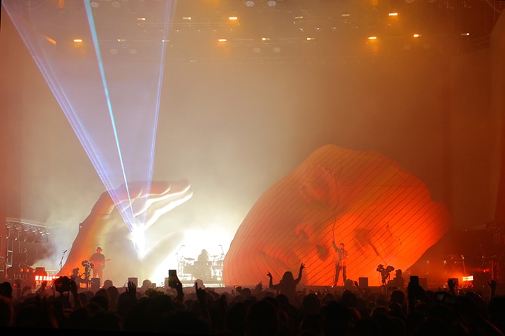 Es Devlin Stuns Coachella Audience With Humongous Cracked Mask Sculpture