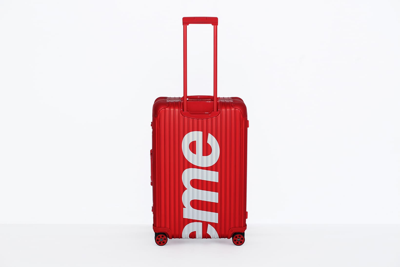 supreme red suitcase