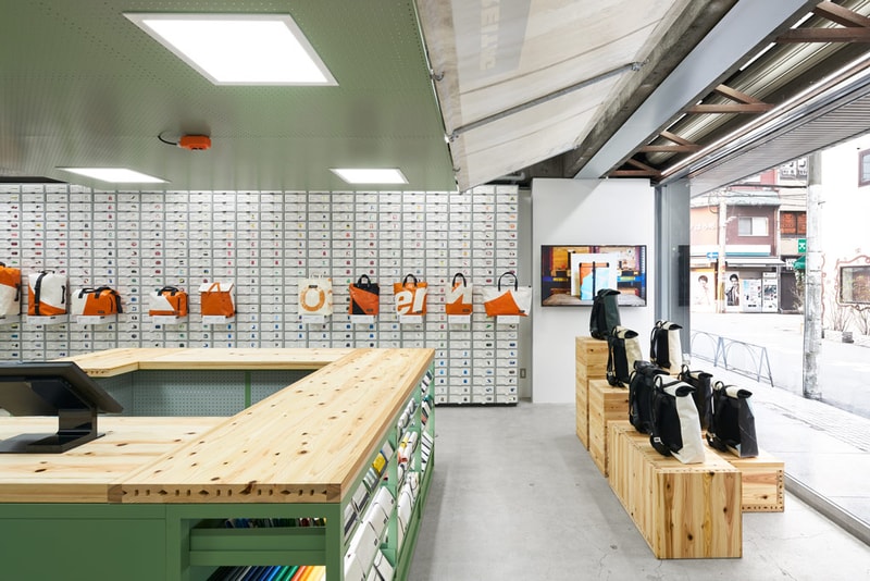 TORAFU ARCHITECTS FREITAG Osaka Store Kiosk Outfitter Shop Store Colorful Messenger Bags Accessories Wooden Steel Furniture Industrial Atmosphere