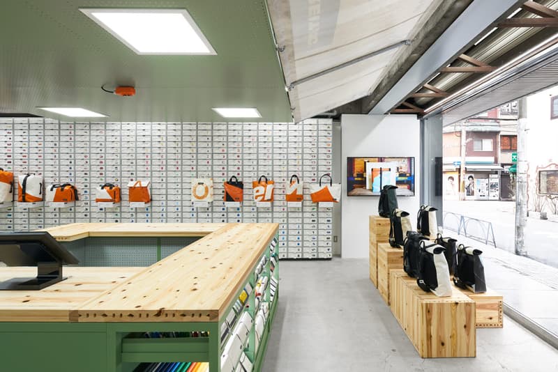 TORAFU ARCHITECTS FREITAG Osaka Store Kiosk Outfitter Shop Store Colorful Messenger Bags Accessories Wooden Steel Furniture Industrial Atmosphere