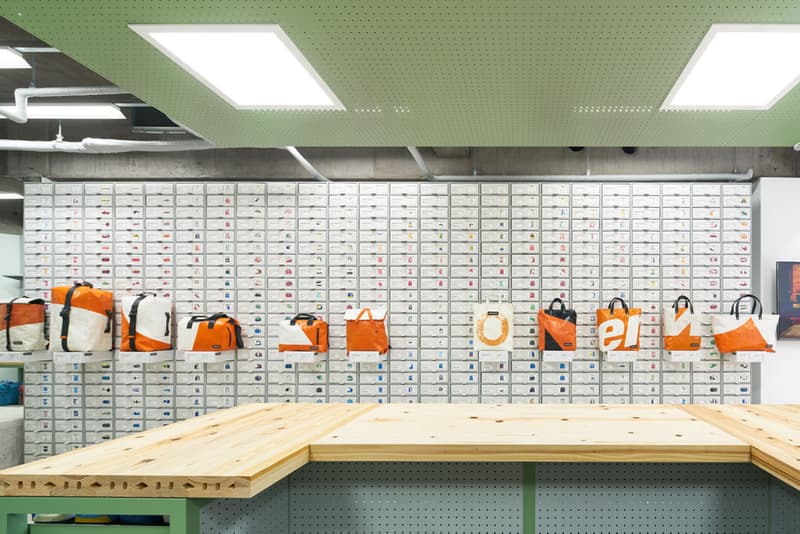 TORAFU ARCHITECTS FREITAG Osaka Store Kiosk Outfitter Shop Store Colorful Messenger Bags Accessories Wooden Steel Furniture Industrial Atmosphere