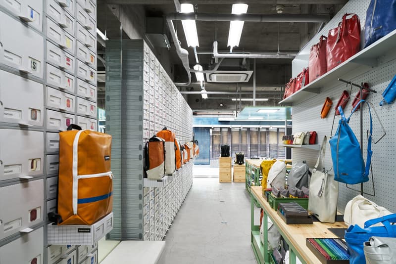 TORAFU ARCHITECTS FREITAG Osaka Store Kiosk Outfitter Shop Store Colorful Messenger Bags Accessories Wooden Steel Furniture Industrial Atmosphere