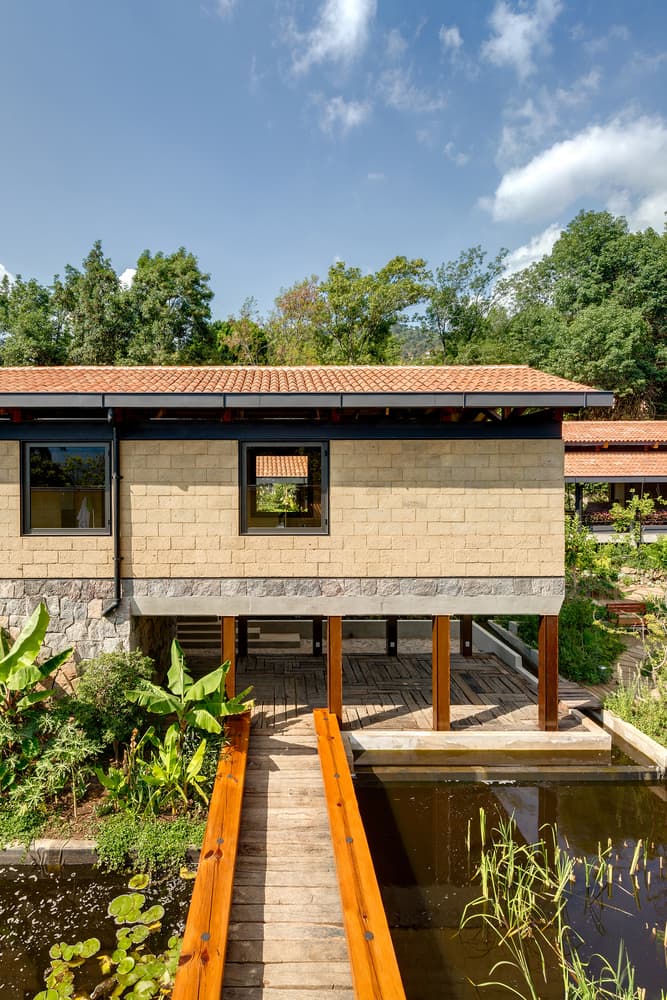 El Humedal Building Mexico TAAR Taller de Arquitectura de Alto Rendimiento Greenery Plants Trees Stone Brick Building