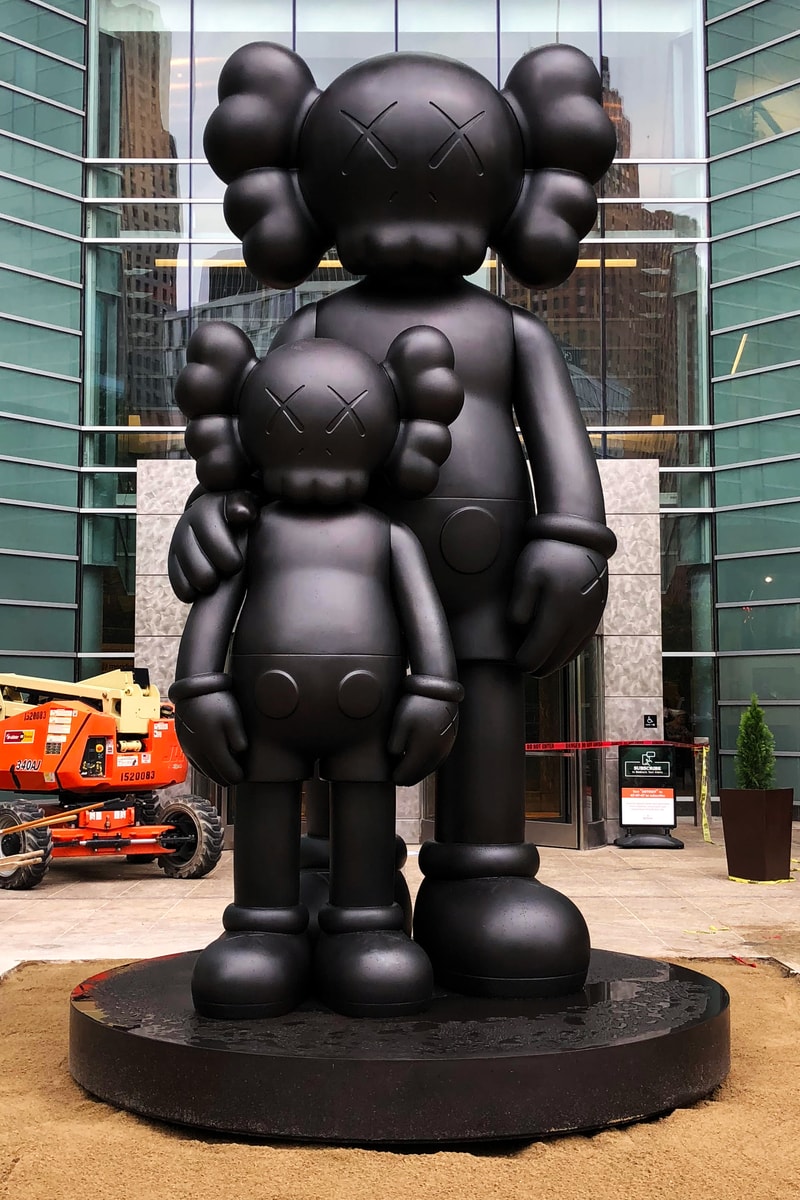 KAWS Unveils Waiting Sculpture in Detroit