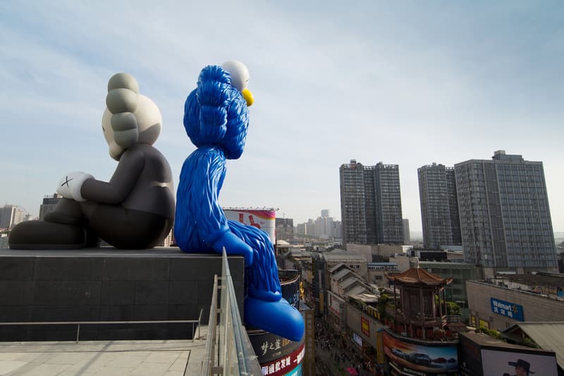 kaws seeing watching companion bff permanent sculptures installations changsha ifs
