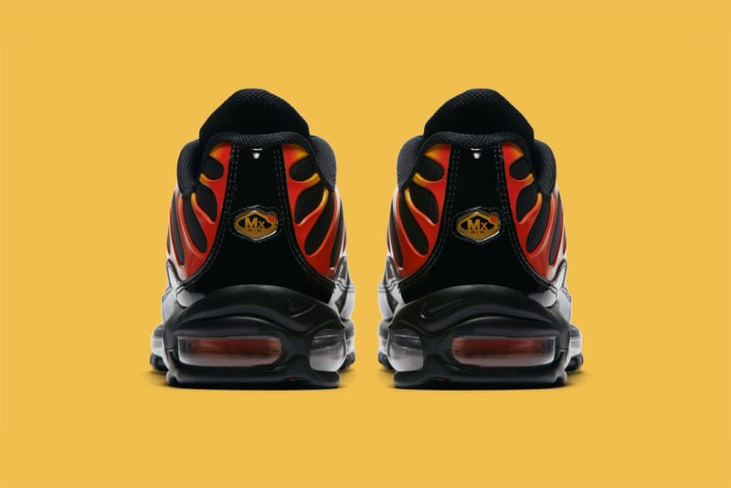 black and yellow air max 97 plus