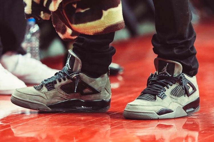 Travis Scott Sports the Air Jordan 4 “Dark Grey” to Game 1 of the NBA Western Conference Finals