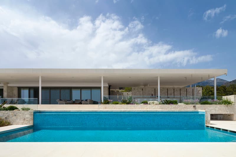 House by the Sea GERNER GERNER Plus Architects Greece Houses Modern Interior Exterior Swimming Pool Plants Mountains Field Hills View Holiday