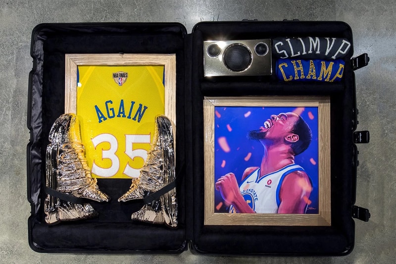 Kevin Durant Nike KD 10 “Art Of A Champion” Gold dipped NBA Golden State Warriors special suitcase alongside merchandise KD artwork 16 slash mark hangtag