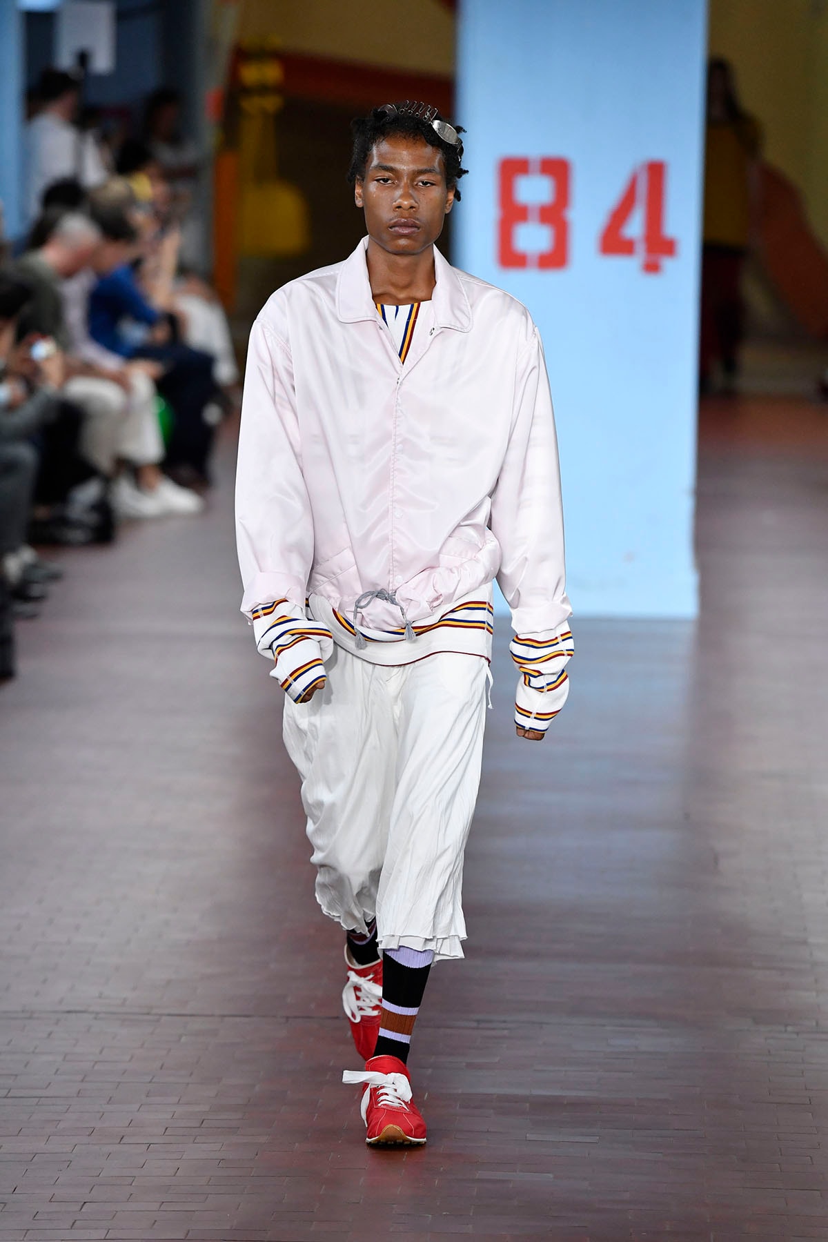 Gucci mixes fashion with sportswear at Milan Fashion Week return