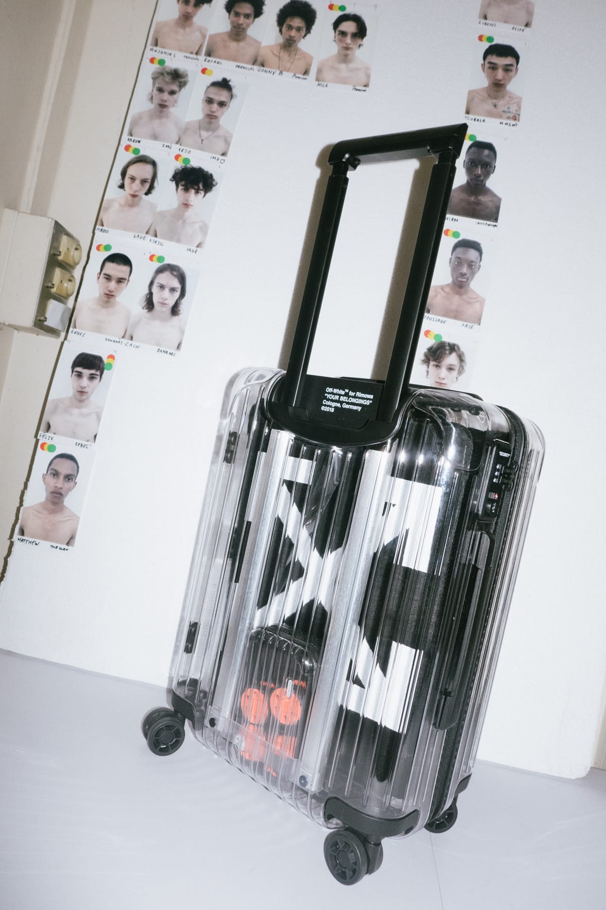 off white clear suitcase