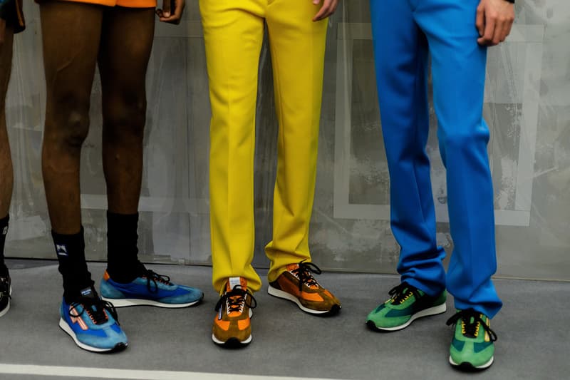 Prada Spring/Summer 2019 Backstage Milan Fashion Week Miuccia Prada Cloudbust Sneakers Shorts Denim